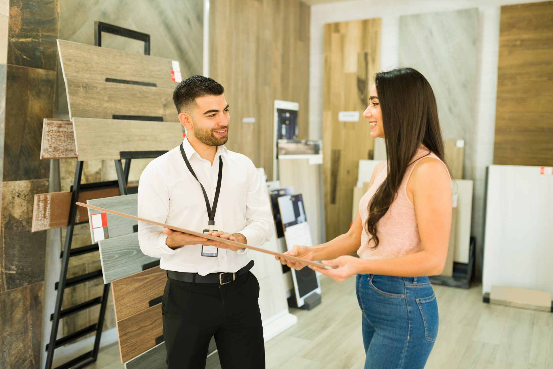 Excited woman buying new flooring